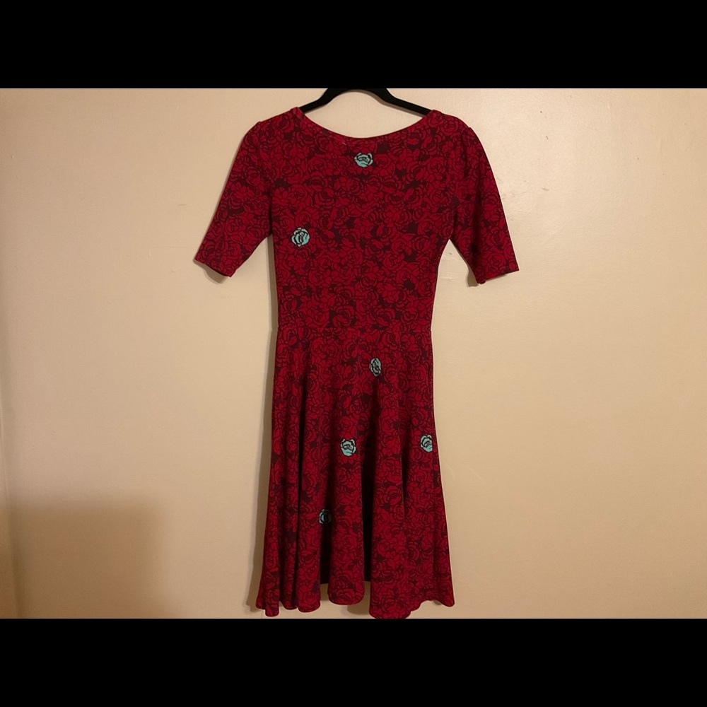 Lularoe size small red dress with black flowers.